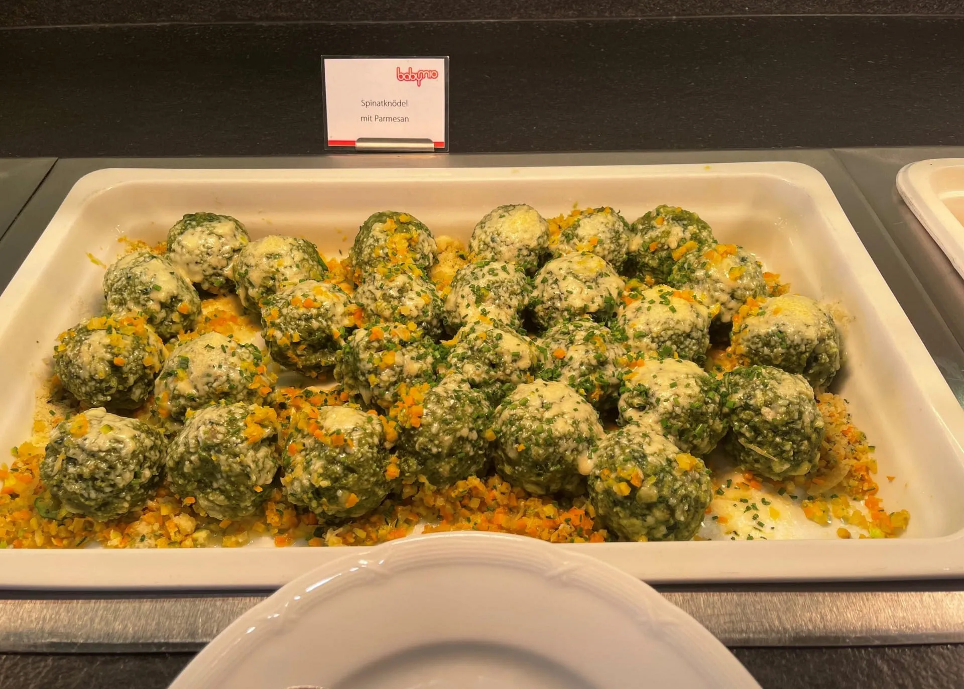 Spinatknödel mit Parmesan, ein klassisches Tiroler Gericht
